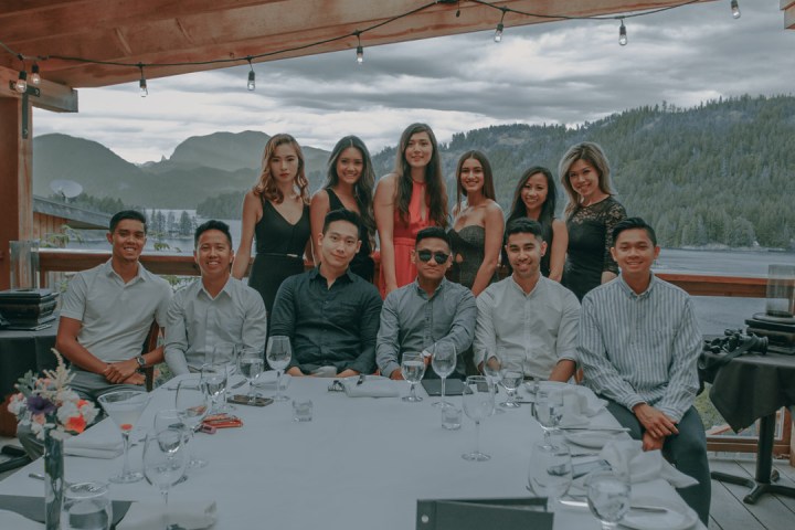 a group of people around a table